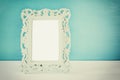 Image of vintage antique classical frame on wooden table Royalty Free Stock Photo