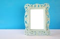 Image of vintage antique classical frame on wooden table Royalty Free Stock Photo