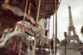 Image of vintage carousel near Eiffel tower in Paris, France Royalty Free Stock Photo