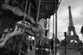 Image of vintage carousel near Eiffel tower in Paris, France Royalty Free Stock Photo