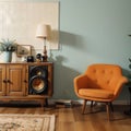 Vintage interior of retro orange armchair vintage wooden light blue sideboard old phonograph (gramophone) vinyl records on Royalty Free Stock Photo