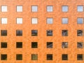 Image of a wall. Building with square windows. Pattern of squares.