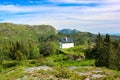 A Lone White Cabin on The Top of Mountain