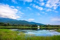 white house near the lake with mountain. Royalty Free Stock Photo