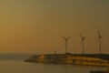 wind turbines on the cape at sunset Royalty Free Stock Photo