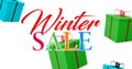 Image of winter sale text over presents falling at christmas