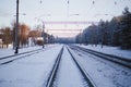 The image of a winter view of the railroad tracks