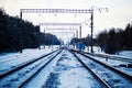 The image of a winter view of the railroad tracks