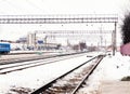 The image of a winter view of the railroad tracks