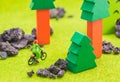 image of woman(mini figure dolls) with retro bicycle alone in a