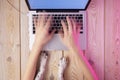 Image of womanÃ¢â¬â¢s hands typing fast on laptop keyboard. View from above. Remote work concept image Royalty Free Stock Photo