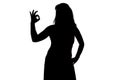 Image of woman's silhouette showing okey