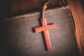 Image of wooden cross on bible background Royalty Free Stock Photo