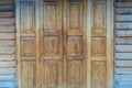 Door wooden pattern textured background, antique place in Thailand. Royalty Free Stock Photo