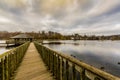 Image of a wooden path leading to a gazebo in the middle of the Doyards lake