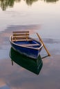 Image of wooden rowing boat on lake Royalty Free Stock Photo