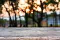 Image of wooden table in front of abstract blurred background Royalty Free Stock Photo