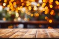 Image of wooden table in front of abstract blurred restaurant lights background