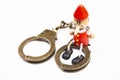 Image of wooden toy handcuffs white background