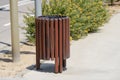 Wooden trash bin in the street