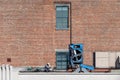 workers on a house facade in New York