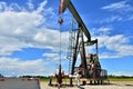 Working Oil Well Pump Jack Royalty Free Stock Photo
