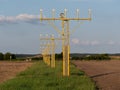 Image of yellow airport signal lights for airplanes