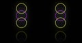 Image of yellow and pink neon circles on black background Royalty Free Stock Photo