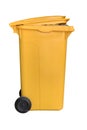 Yellow plastic dumpster on wheels isolated on white background Royalty Free Stock Photo