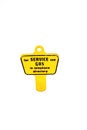 Yellow plastic meter key Royalty Free Stock Photo
