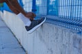 Image of a young African athlete tying sneakers Royalty Free Stock Photo