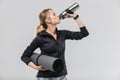 Image of young blond woman 20s dressed in sportswear carrying yoga mat while walking Royalty Free Stock Photo