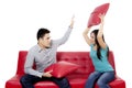Young couple fighting on studio Royalty Free Stock Photo