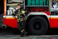 Image of young fireman man near fire truck Royalty Free Stock Photo