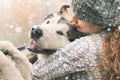 Image of young girl with her dog, alaskan malamute, outdoor Royalty Free Stock Photo