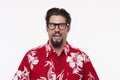 Image of a young man in Hawaiian shirt making a face Royalty Free Stock Photo
