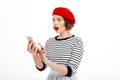 Young shocked woman chatting by mobile phone Royalty Free Stock Photo