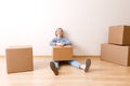 Image of young woman with cardboard box Royalty Free Stock Photo