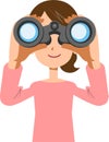 A young woman looking into binoculars Royalty Free Stock Photo