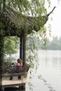 Image of young women relaxing at The Xihu lake