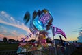 Zipper carnival county fair ride blurred at dusk