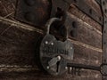 Key to happiness - Key with a secret formed by the word life opening an old padlock with the inscription happiness that is closing Royalty Free Stock Photo