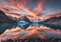 Beatiful sunset with mountains in the background and a lake, v16