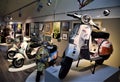 Images of artistic wasps, on two wheels, inside the Piaggio museum.