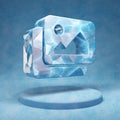 Images icon. Cracked blue Ice Images symbol on blue snow podium