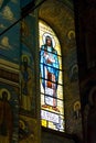 Images of Orthodox saint on the stained glass window of the Cathedral Royalty Free Stock Photo