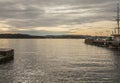 Oslo marina - dark waters of the fjord at sunset. Royalty Free Stock Photo