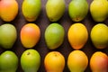 ImageStock Artistic capture of mangos arranged neatly on the kitchen table