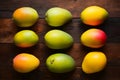 ImageStock Artistic capture of mangos arranged neatly on the kitchen table