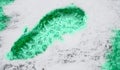 Imaginary malachite footprint in abstract snow surface